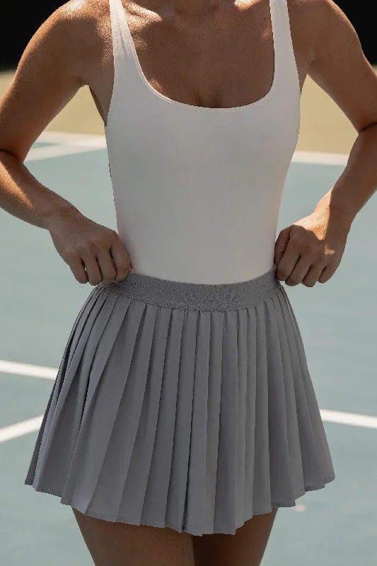Pleated Tennis Skirt in Ice Grey asymmetrical skirt cut